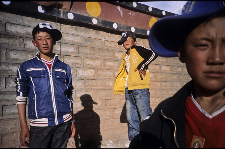 The youngest like to wear western clothes, like nylon jackets and caps.